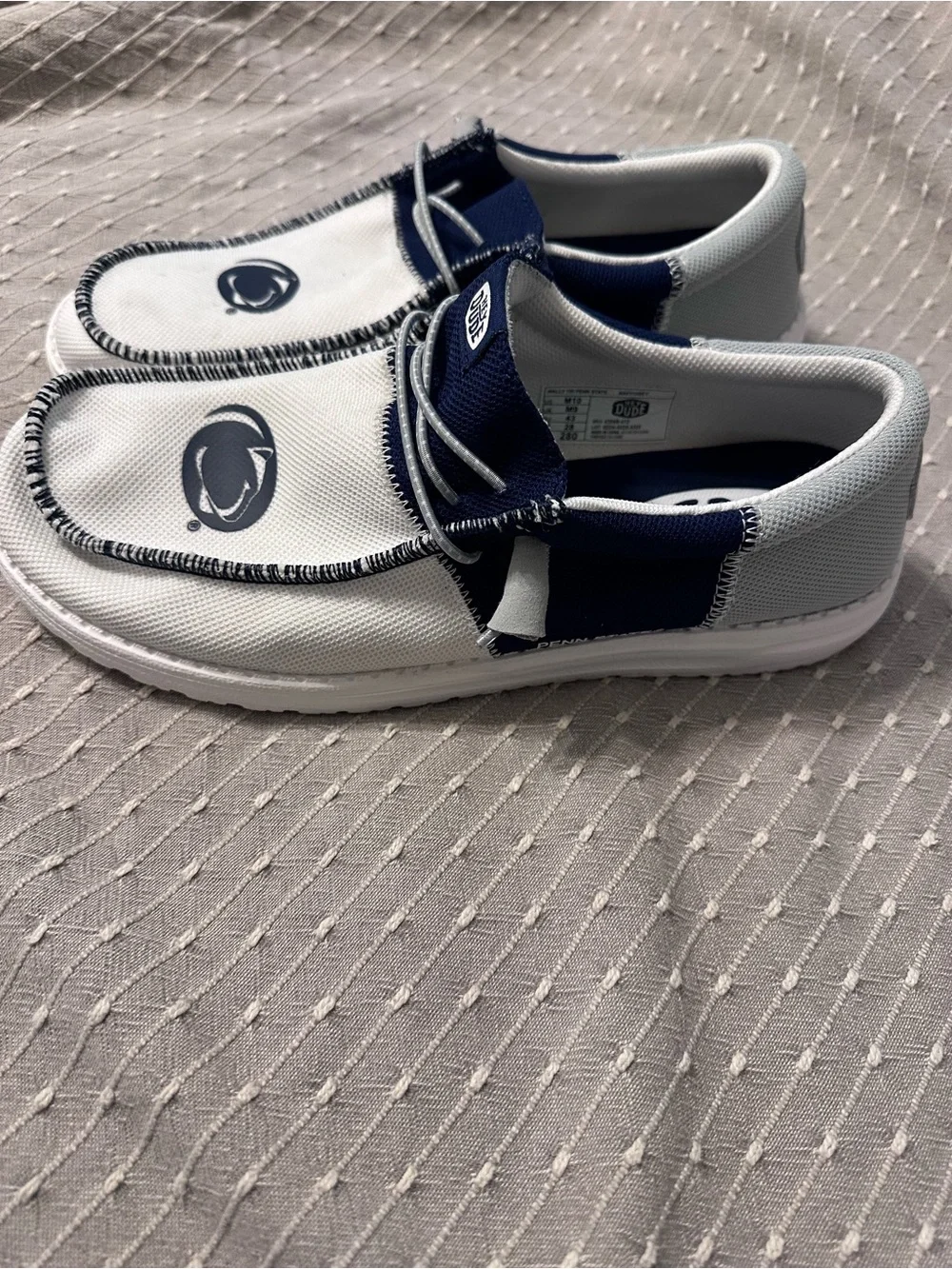 Hey Dude Men’s White and Navy Slip-On Sneakers with Elastic Laces